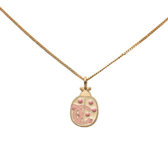 CHANEL Jewelry - CHANEL Pink Logo Necklace